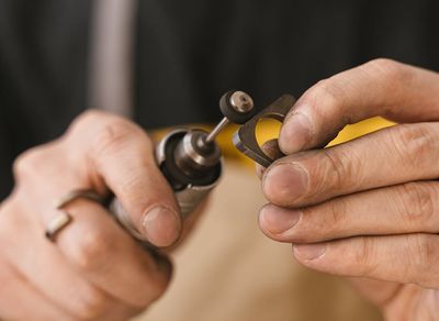 Close-up of hands in a precise, focused position.